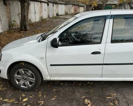 Білий Рено Логан, об'ємом двигуна 1.39 л та пробігом 174 тис. км за 5200 $, фото 2 на Automoto.ua