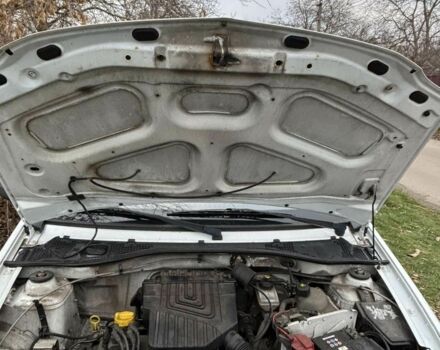 Белый Рено Логан, объемом двигателя 1.4 л и пробегом 246 тыс. км за 3500 $, фото 3 на Automoto.ua