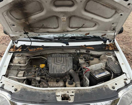 Білий Рено Логан, об'ємом двигуна 1.39 л та пробігом 211 тис. км за 2900 $, фото 11 на Automoto.ua