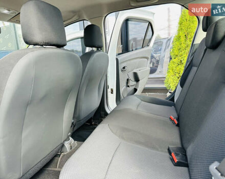 Белый Рено Логан, объемом двигателя 1.46 л и пробегом 151 тыс. км за 6600 $, фото 14 на Automoto.ua