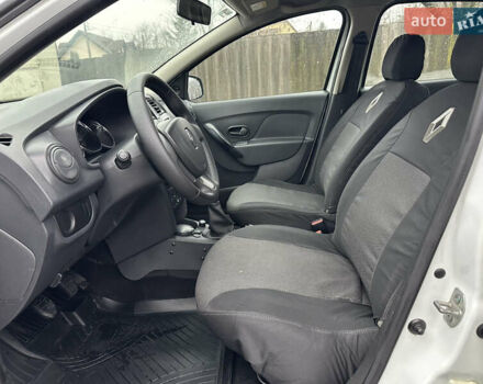 Білий Рено Логан, об'ємом двигуна 1.2 л та пробігом 277 тис. км за 4500 $, фото 9 на Automoto.ua