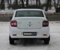 Білий Рено Логан, об'ємом двигуна 1.2 л та пробігом 338 тис. км за 3900 $, фото 4 на Automoto.ua
