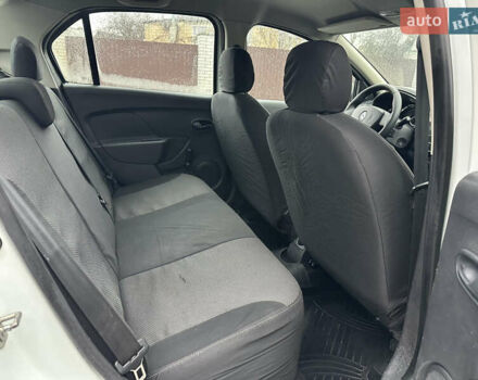 Білий Рено Логан, об'ємом двигуна 1.2 л та пробігом 277 тис. км за 4500 $, фото 14 на Automoto.ua