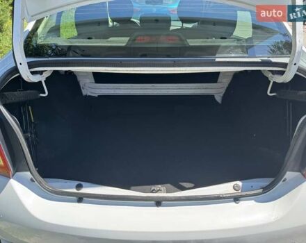 Білий Рено Логан, об'ємом двигуна 1.2 л та пробігом 135 тис. км за 4750 $, фото 4 на Automoto.ua