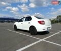 Білий Рено Логан, об'ємом двигуна 1.1 л та пробігом 565 тис. км за 4100 $, фото 1 на Automoto.ua