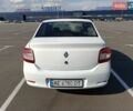 Білий Рено Логан, об'ємом двигуна 1.1 л та пробігом 565 тис. км за 4100 $, фото 4 на Automoto.ua
