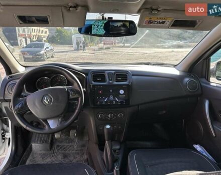 Рено Логан 2013 у Дніпро (Дніпропетровську) на Automoto.ua Білий Рено Логан, об'ємом двигуна 1.15 л та пробігом 313 тис. км за 5500 $, фото 10 на Automoto.ua