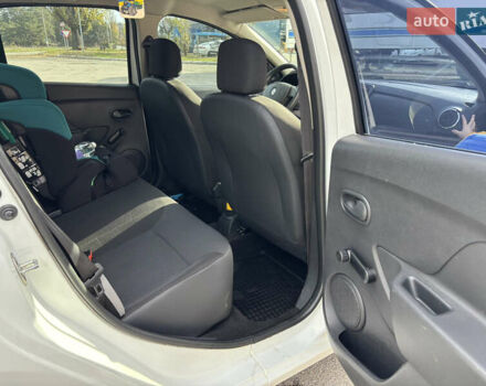 Белый Рено Логан, объемом двигателя 1.2 л и пробегом 180 тыс. км за 5800 $, фото 14 на Automoto.ua