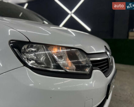 Білий Рено Логан, об'ємом двигуна 1.2 л та пробігом 197 тис. км за 5700 $, фото 13 на Automoto.ua