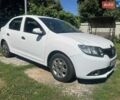 Білий Рено Логан, об'ємом двигуна 1.2 л та пробігом 180 тис. км за 4086 $, фото 1 на Automoto.ua