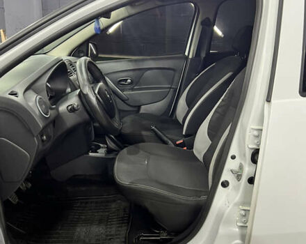 Білий Рено Логан, об'ємом двигуна 1.2 л та пробігом 197 тис. км за 5700 $, фото 32 на Automoto.ua