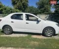 Білий Рено Логан, об'ємом двигуна 1.2 л та пробігом 180 тис. км за 4086 $, фото 2 на Automoto.ua