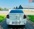 Білий Рено Логан, об'ємом двигуна 1.46 л та пробігом 87 тис. км за 7800 $, фото 3 на Automoto.ua