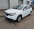 Білий Рено Логан, об'ємом двигуна 1.2 л та пробігом 200 тис. км за 3999 $, фото 4 на Automoto.ua