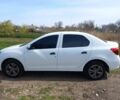 Білий Рено Логан, об'ємом двигуна 1.5 л та пробігом 87 тис. км за 8599 $, фото 1 на Automoto.ua