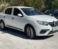 Білий Рено Логан, об'ємом двигуна 1.1 л та пробігом 200 тис. км за 5300 $, фото 2 на Automoto.ua
