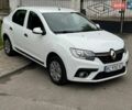 Белый Рено Логан, объемом двигателя 1.46 л и пробегом 325 тыс. км за 5550 $, фото 1 на Automoto.ua