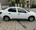 Білий Рено Логан, об'ємом двигуна 1.5 л та пробігом 325 тис. км за 5800 $, фото 1 на Automoto.ua