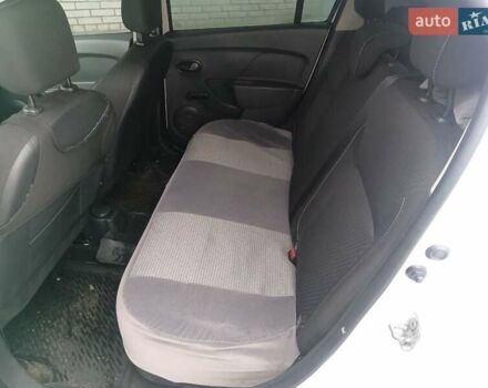 Білий Рено Логан, об'ємом двигуна 1.46 л та пробігом 267 тис. км за 6300 $, фото 13 на Automoto.ua