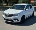 Білий Рено Логан, об'ємом двигуна 1.15 л та пробігом 264 тис. км за 5990 $, фото 3 на Automoto.ua