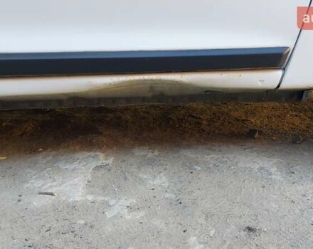 Белый Рено Логан, объемом двигателя 1 л и пробегом 388 тыс. км за 5000 $, фото 13 на Automoto.ua