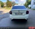 Белый Рено Логан, объемом двигателя 1.5 л и пробегом 270 тыс. км за 5650 $, фото 4 на Automoto.ua