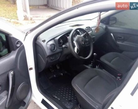 Белый Рено Логан, объемом двигателя 1 л и пробегом 204 тыс. км за 4999 $, фото 2 на Automoto.ua
