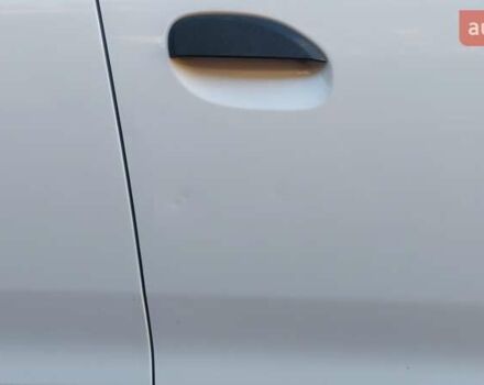 Белый Рено Логан, объемом двигателя 1 л и пробегом 388 тыс. км за 5000 $, фото 14 на Automoto.ua