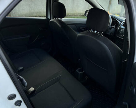 Белый Рено Логан, объемом двигателя 1 л и пробегом 177 тыс. км за 5699 $, фото 5 на Automoto.ua