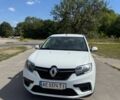 Білий Рено Логан, об'ємом двигуна 1 л та пробігом 157 тис. км за 5800 $, фото 1 на Automoto.ua