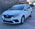 Белый Рено Логан, объемом двигателя 1 л и пробегом 267 тыс. км за 3999 $, фото 1 на Automoto.ua