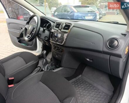 Белый Рено Логан, объемом двигателя 1 л и пробегом 130 тыс. км за 5750 $, фото 11 на Automoto.ua