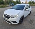 Белый Рено Логан, объемом двигателя 1 л и пробегом 234 тыс. км за 2950 $, фото 1 на Automoto.ua