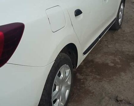 Белый Рено Логан, объемом двигателя 1 л и пробегом 162 тыс. км за 5500 $, фото 4 на Automoto.ua