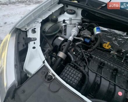 Білий Рено Логан, об'ємом двигуна 1 л та пробігом 89 тис. км за 4650 $, фото 12 на Automoto.ua