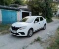 Білий Рено Логан, об'ємом двигуна 1 л та пробігом 190 тис. км за 4500 $, фото 3 на Automoto.ua