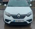Белый Рено Логан, объемом двигателя 1 л и пробегом 188 тыс. км за 4900 $, фото 1 на Automoto.ua