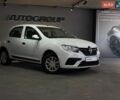 Белый Рено Логан, объемом двигателя 1 л и пробегом 338 тыс. км за 3699 $, фото 1 на Automoto.ua