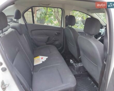 Білий Рено Логан, об'ємом двигуна 1.46 л та пробігом 118 тис. км за 3600 $, фото 9 на Automoto.ua