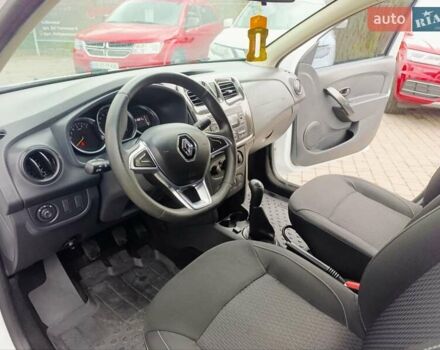 Белый Рено Логан, объемом двигателя 1 л и пробегом 130 тыс. км за 5750 $, фото 8 на Automoto.ua