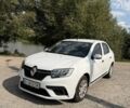 Білий Рено Логан, об'ємом двигуна 1 л та пробігом 220 тис. км за 5000 $, фото 1 на Automoto.ua