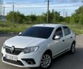 Білий Рено Логан, об'ємом двигуна 1.5 л та пробігом 210 тис. км за 5814 $, фото 1 на Automoto.ua