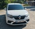 Білий Рено Логан, об'ємом двигуна 1 л та пробігом 258 тис. км за 6500 $, фото 1 на Automoto.ua