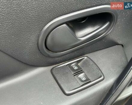 Білий Рено Логан, об'ємом двигуна 1 л та пробігом 55 тис. км за 7990 $, фото 12 на Automoto.ua