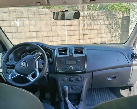 Білий Рено Логан, об'ємом двигуна 1 л та пробігом 190 тис. км за 4300 $, фото 7 на Automoto.ua