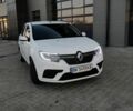 Белый Рено Логан, объемом двигателя 1 л и пробегом 289 тыс. км за 5750 $, фото 1 на Automoto.ua
