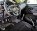 Белый Рено Логан, объемом двигателя 1 л и пробегом 200 тыс. км за 3700 $, фото 10 на Automoto.ua