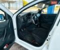 Белый Рено Логан, объемом двигателя 1 л и пробегом 258 тыс. км за 5300 $, фото 4 на Automoto.ua