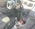 Белый Рено Логан, объемом двигателя 1 л и пробегом 258 тыс. км за 6424 $, фото 4 на Automoto.ua