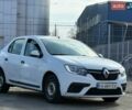 Белый Рено Логан, объемом двигателя 1 л и пробегом 165 тыс. км за 3100 $, фото 1 на Automoto.ua